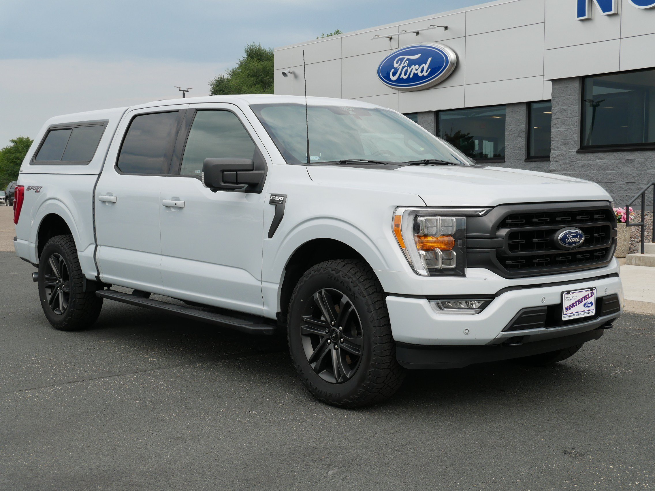 Used 2021 Ford F-150 XLT with VIN 1FTFW1E53MKE04312 for sale in Northfield, Minnesota