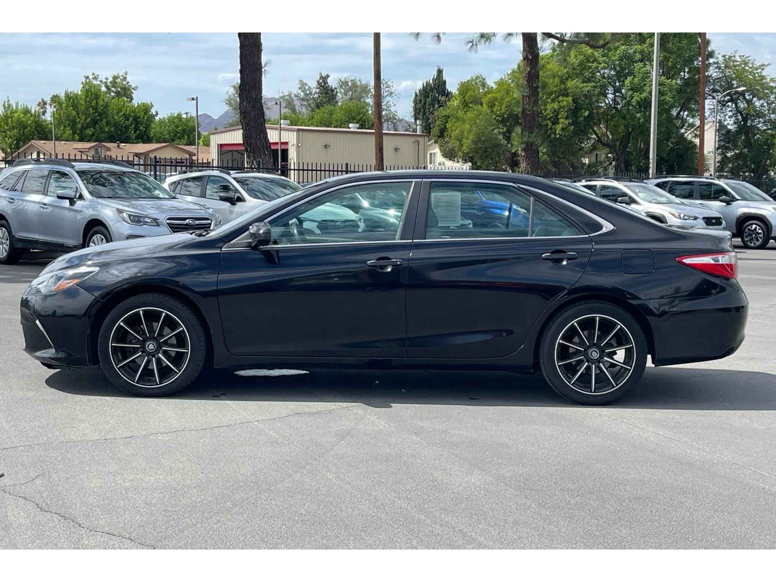 Used 2015 Attitude Black Toyota LE image 3