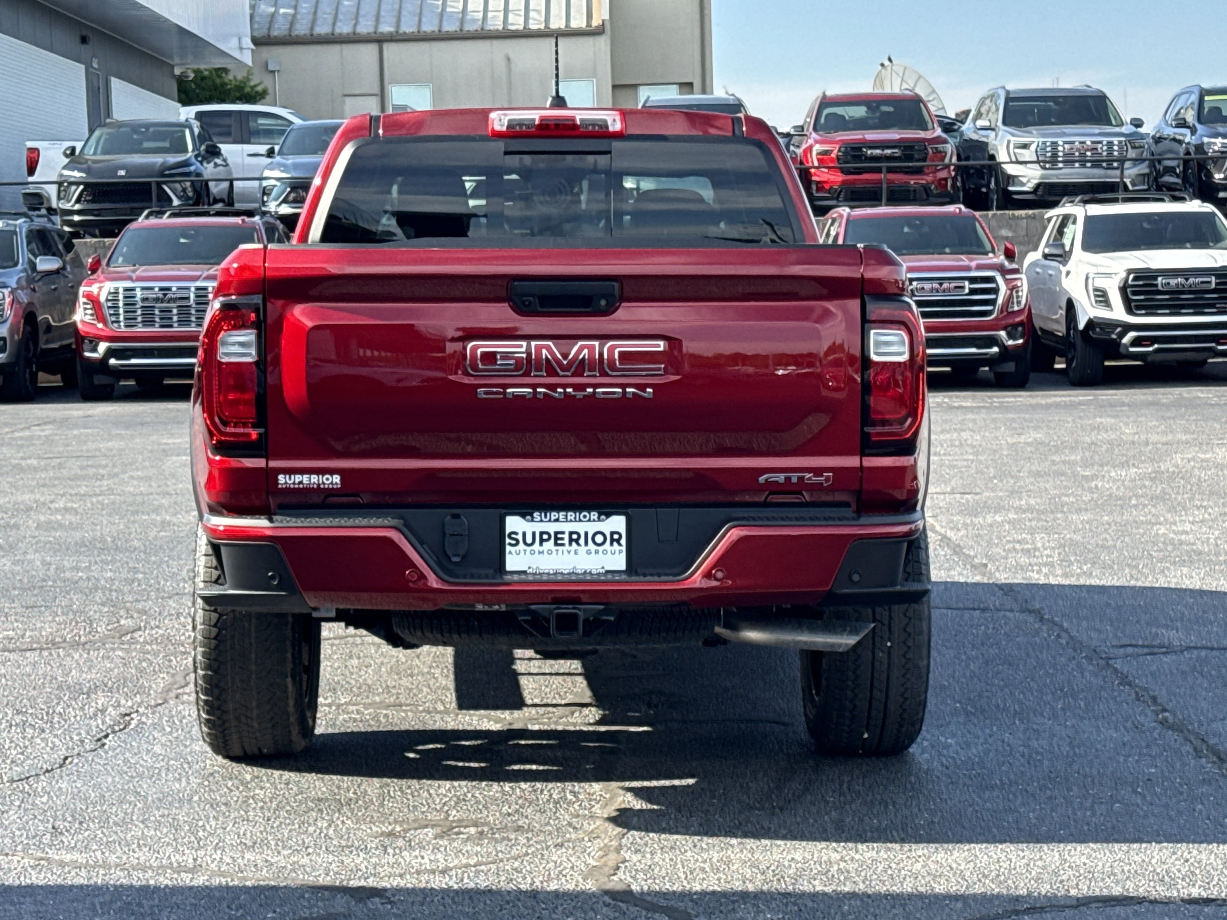 New 2026 Volcanic Red Tintcoat GMC 4WD AT4 image 4