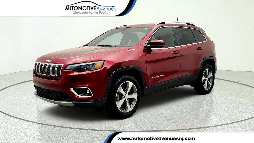 Used 2019 Velvet Red Pearlcoat Jeep Limited 4x4 image 1