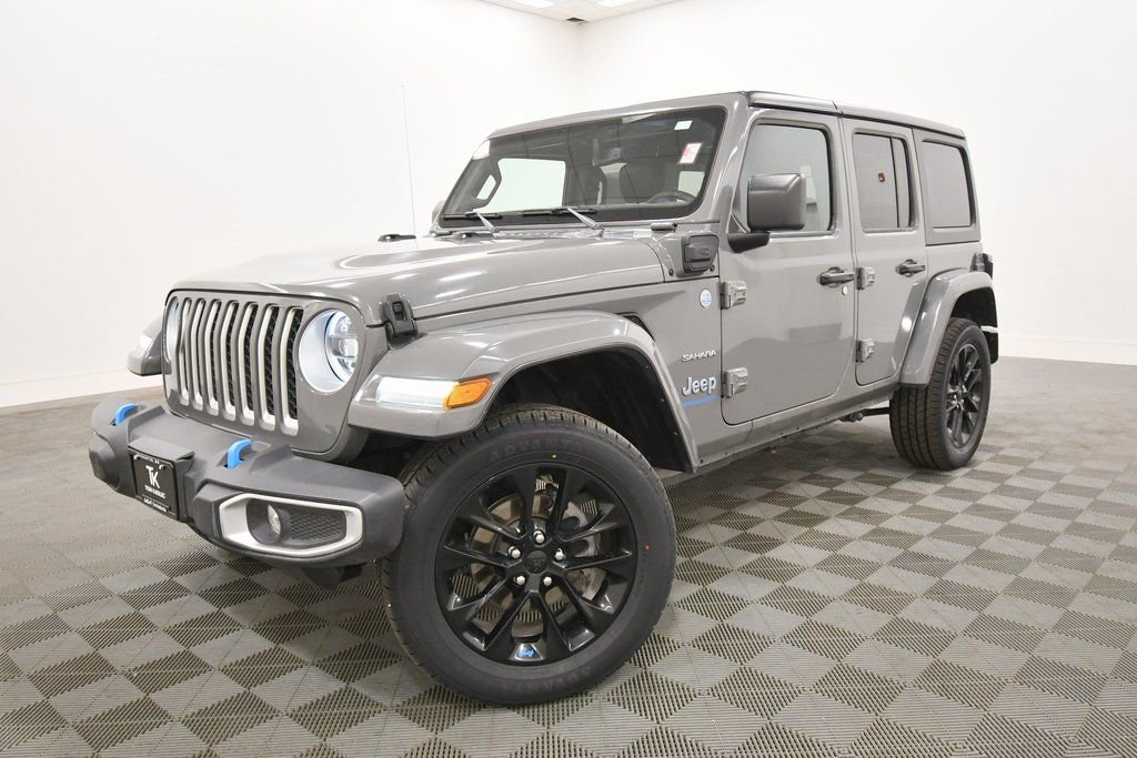 Used 2023 Jeep Wrangler 4xe Sahara 4XE with VIN 1C4JJXP69PW699981 for sale in Rochester, Minnesota