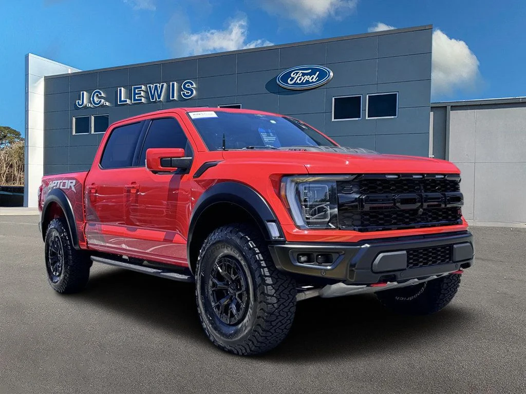 Certified Used 2023 Orange Metallic Ford Raptor image 1