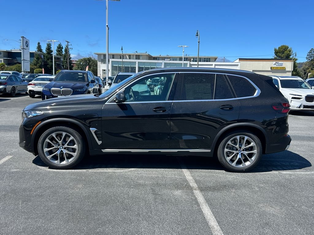 New 2026 Black Sapphire Metallic BMW xDrive50e image 2