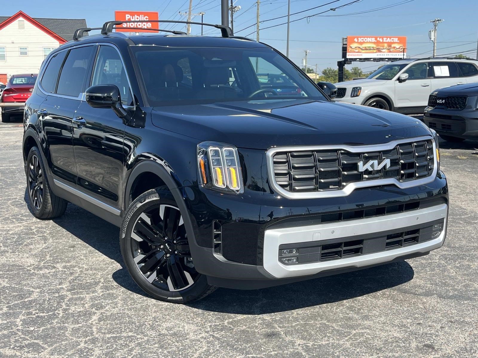Used 2024 Ebony Black Kia SX image 1