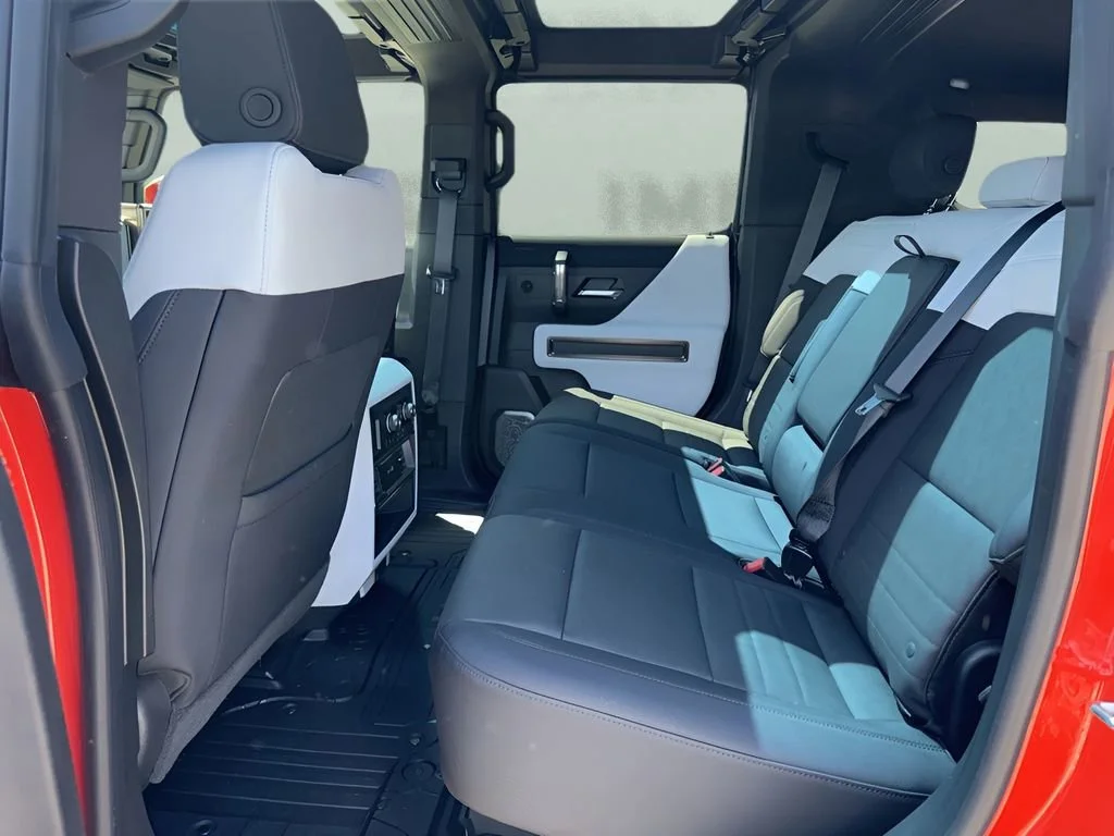 Used 2025 Solar Orange GMC 3X image 12
