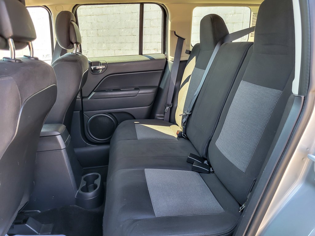 Used 2015 Billet Silver Metallic Clearcoat Jeep Sport image 9