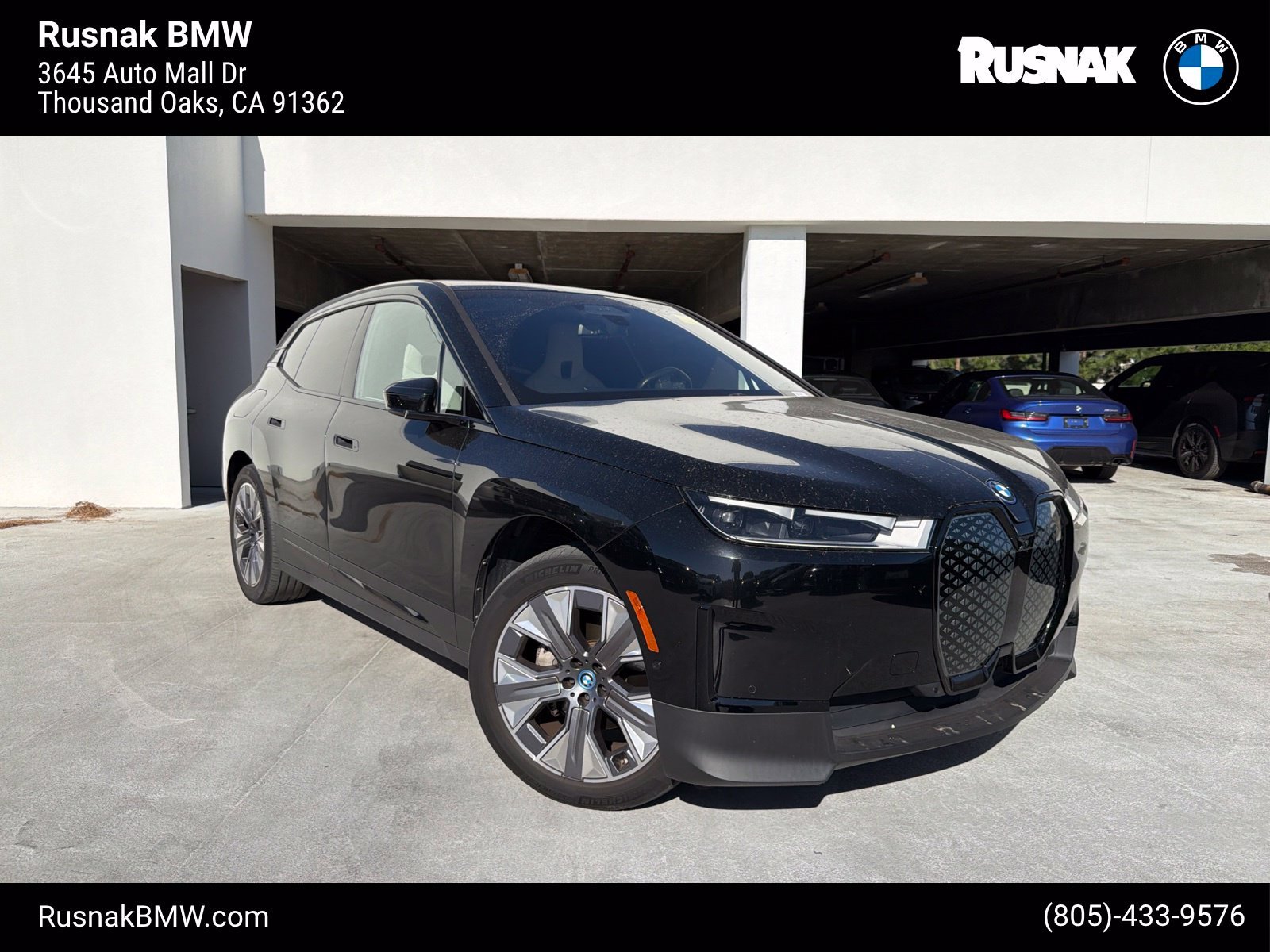 Used 2024 Black Sapphire Metallic BMW xDrive50 image 1