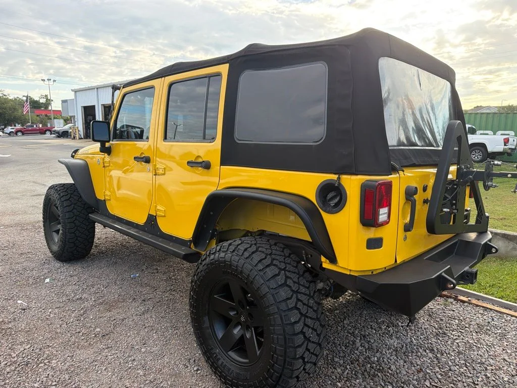 Used 2015 Yellow Jeep Unlimited Rubicon image 2