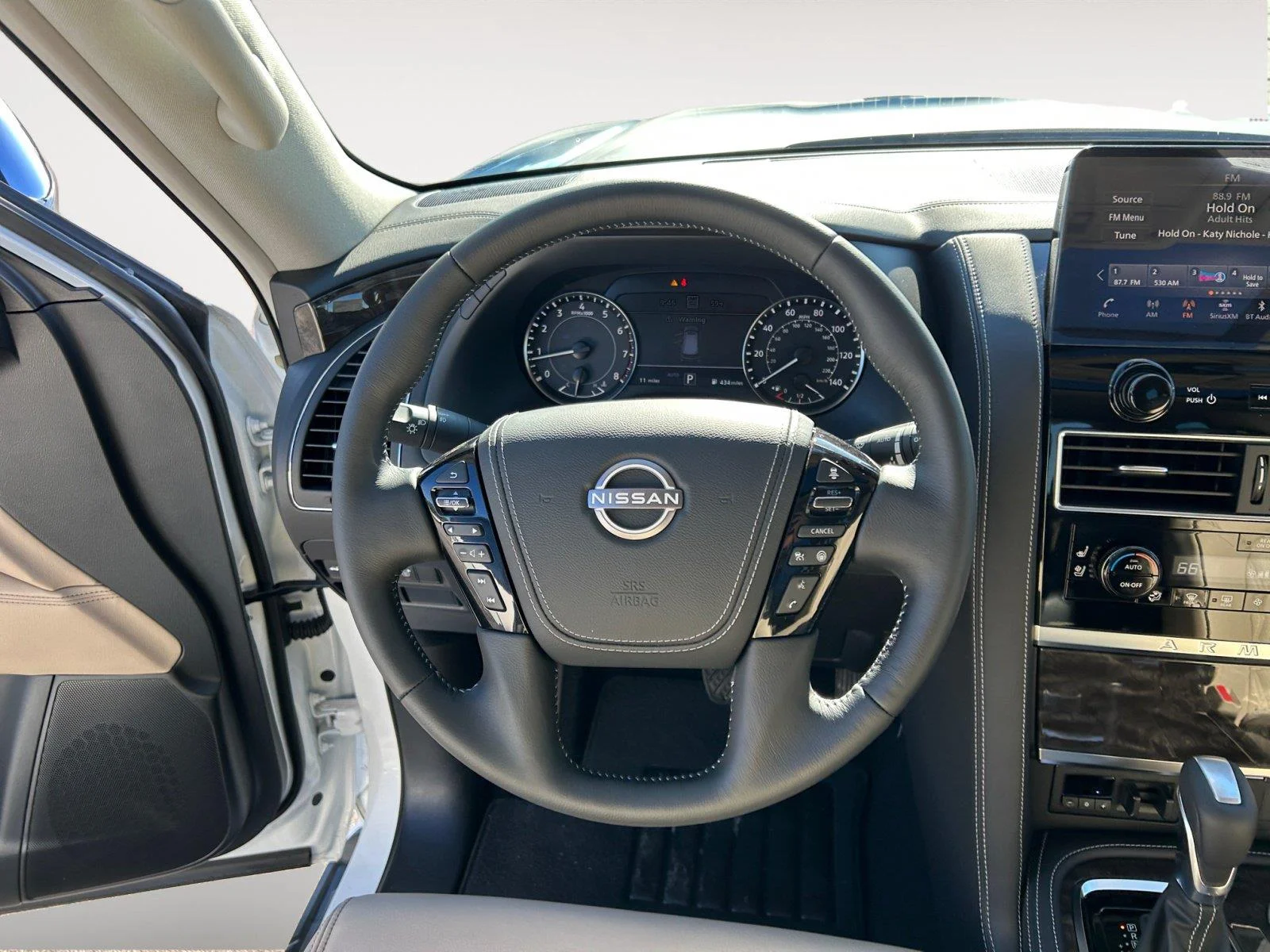Used 2023 Aspen White Tricoat Nissan Platinum image 13