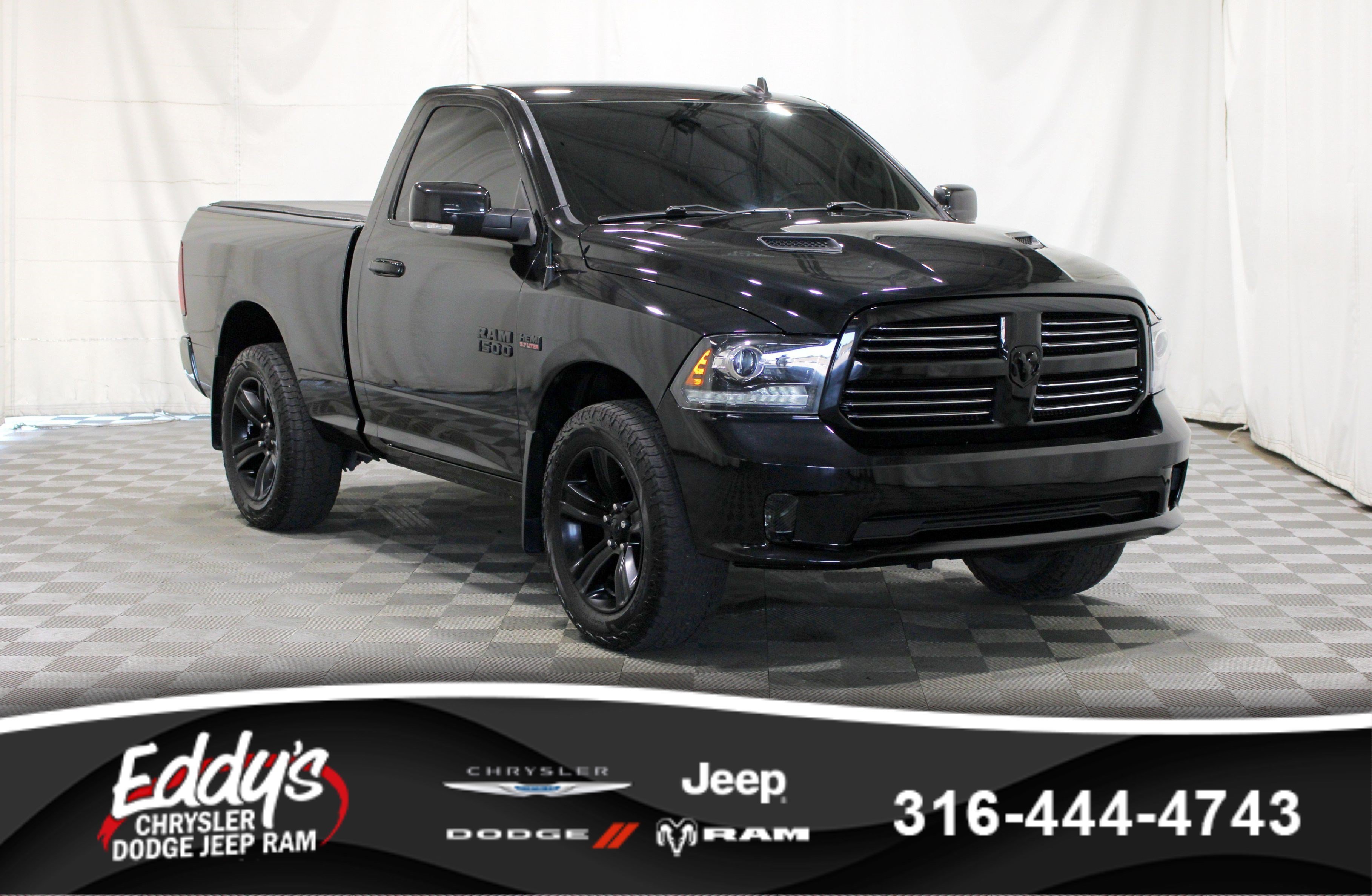 Used 2017 Brilliant Black Crystal Pearlcoat Ram Sport image 1