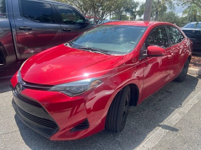 Used 2018 Barcelona Red Metallic Toyota LE image 7