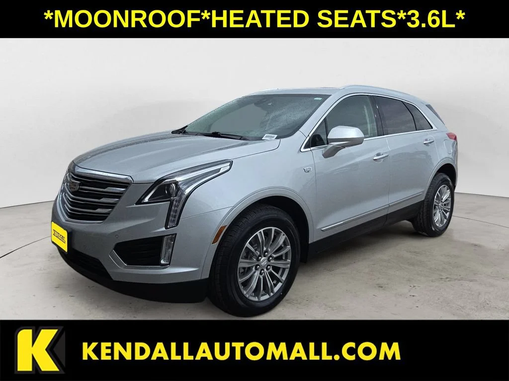 Used 2019 RADIANT SILVER METALLIC Cadillac Luxury AWD image 1