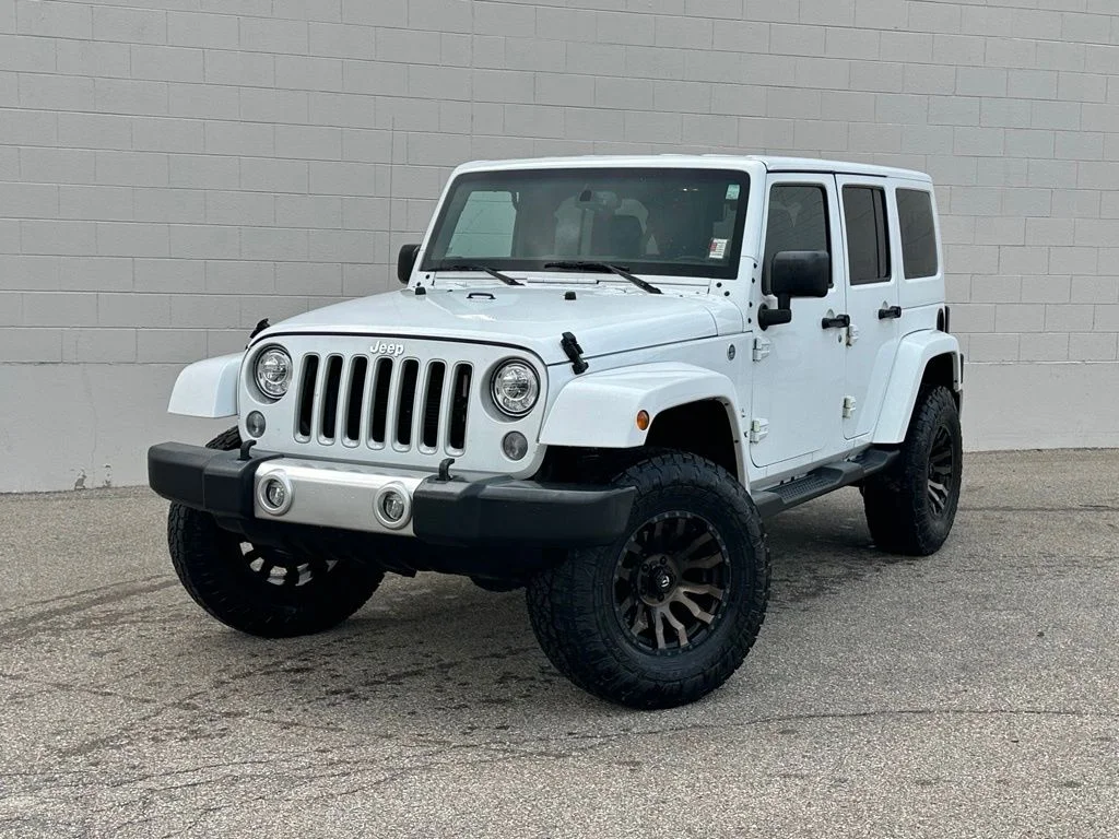 Used 2018 Bright White Clearcoat Jeep Unlimited Sahara image 1