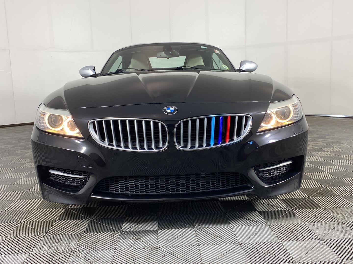 Used 2011 Black Sapphire Metallic BMW sDrive35is image 13