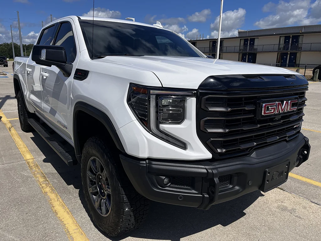 Used 2025 Summit White GMC AT4X image 1