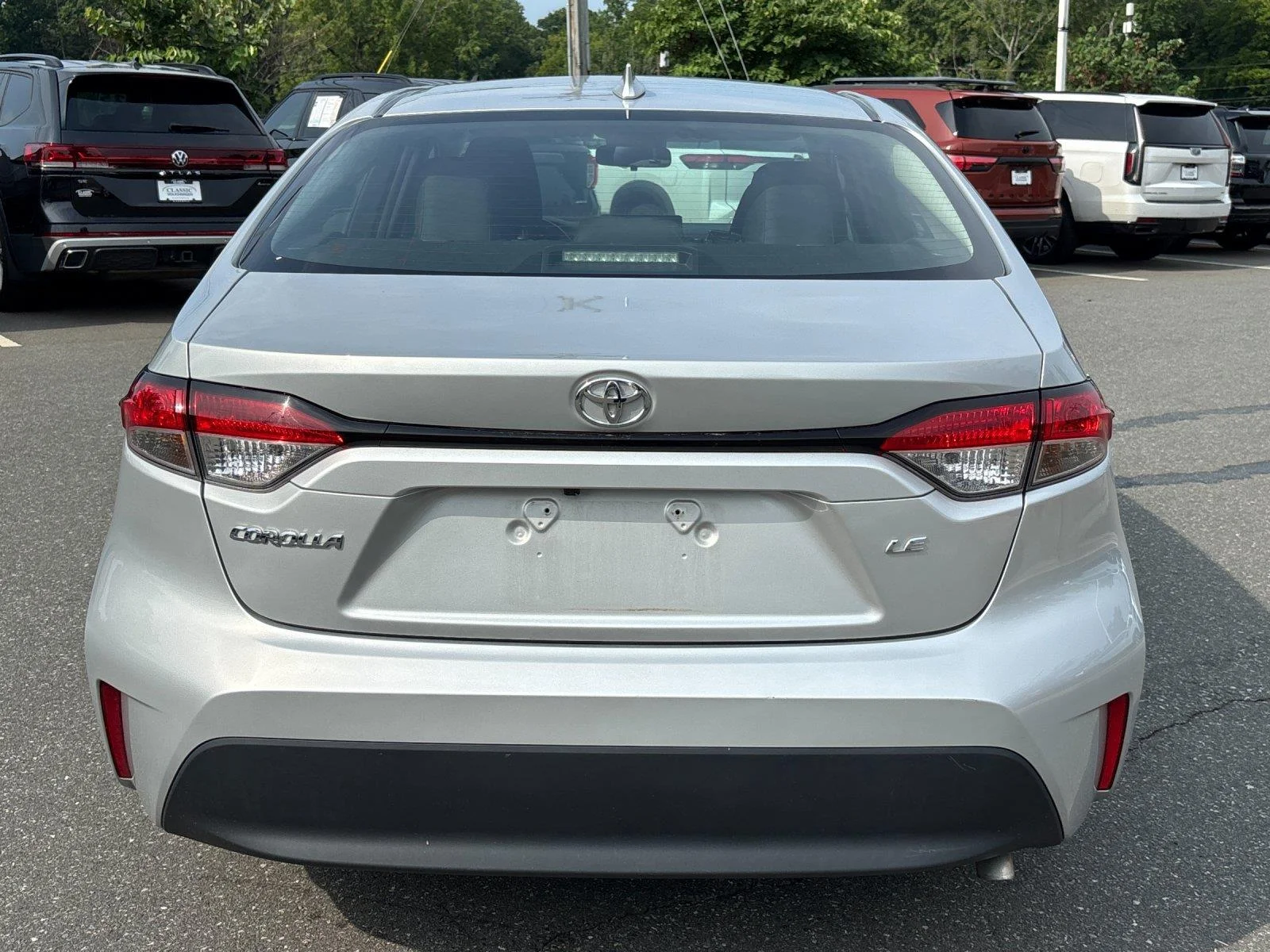 Used 2024 Classic Silver Metallic Toyota LE image 4