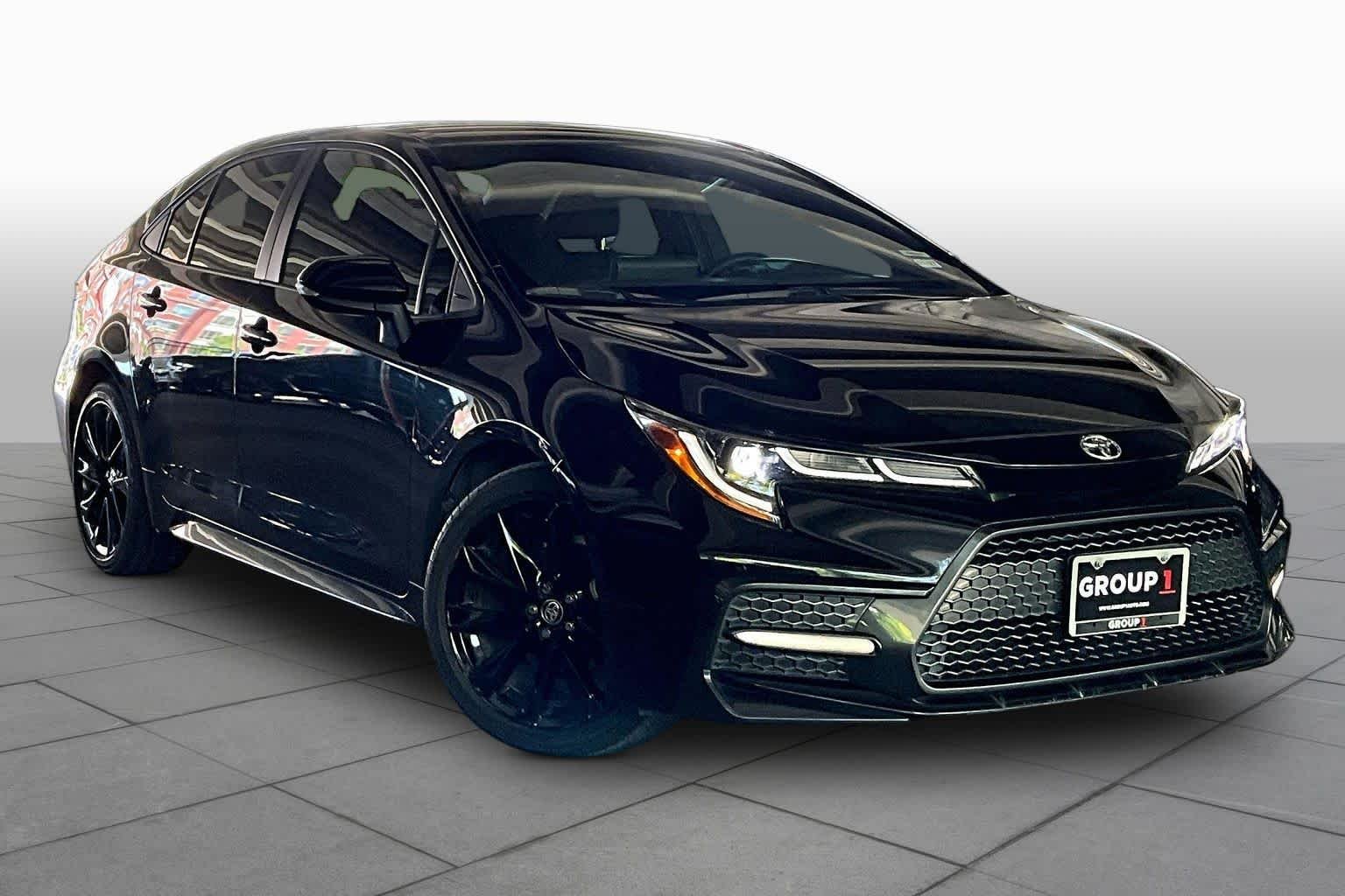 Used 2022 Black Sand Pearl Toyota SE image 2