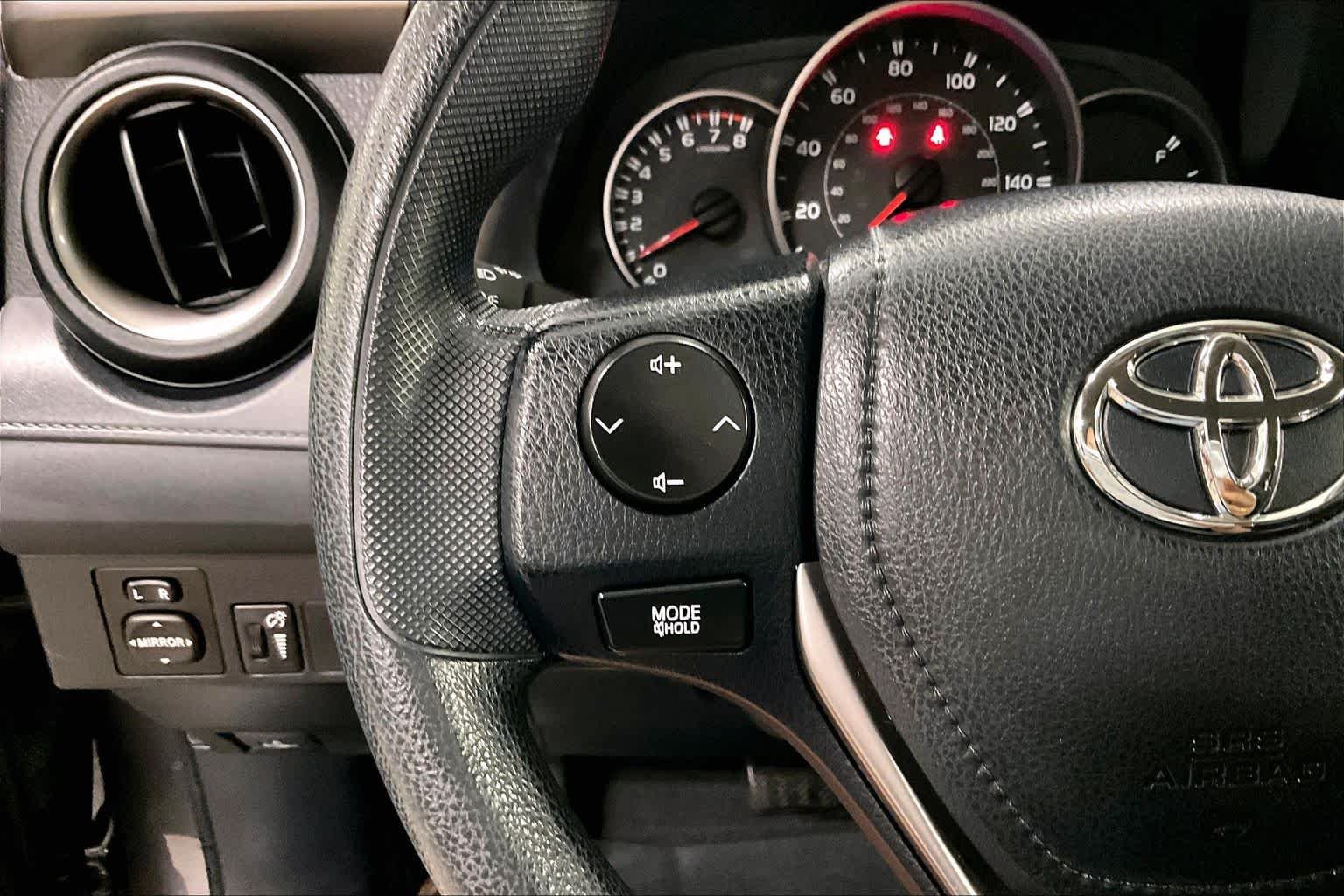 Used 2016 Magnetic Gray Metallic Toyota LE image 23