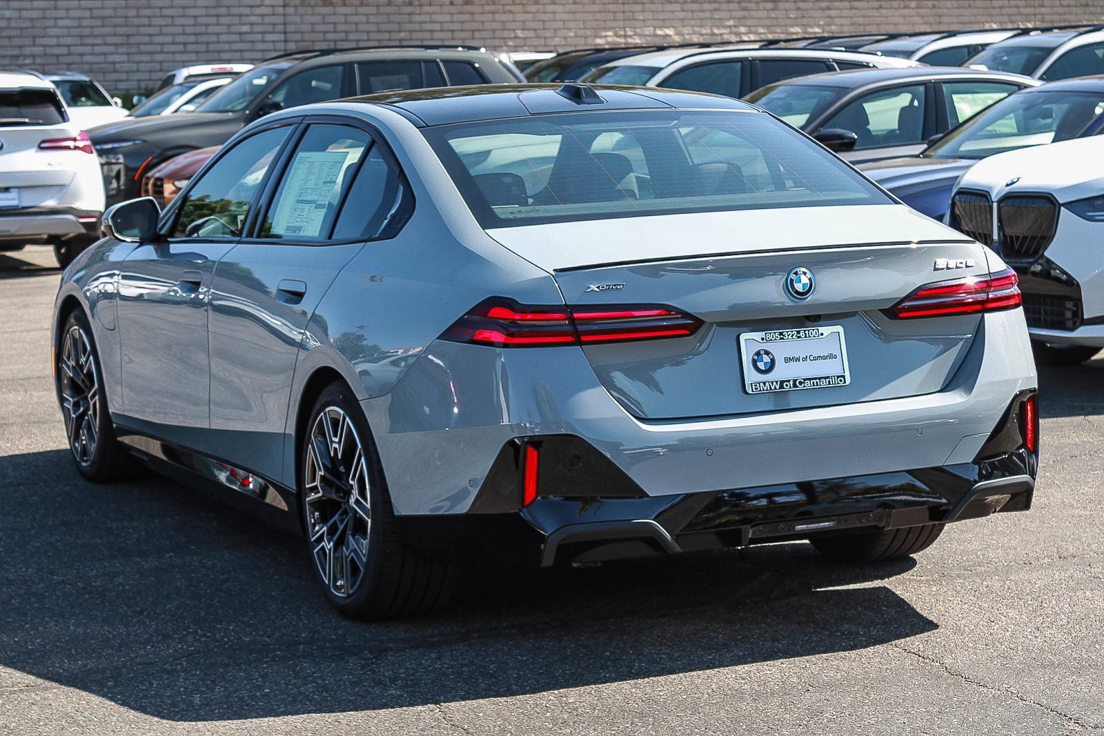 New 2027 Brooklyn Grey Metallic BMW 550e xDrive image 3