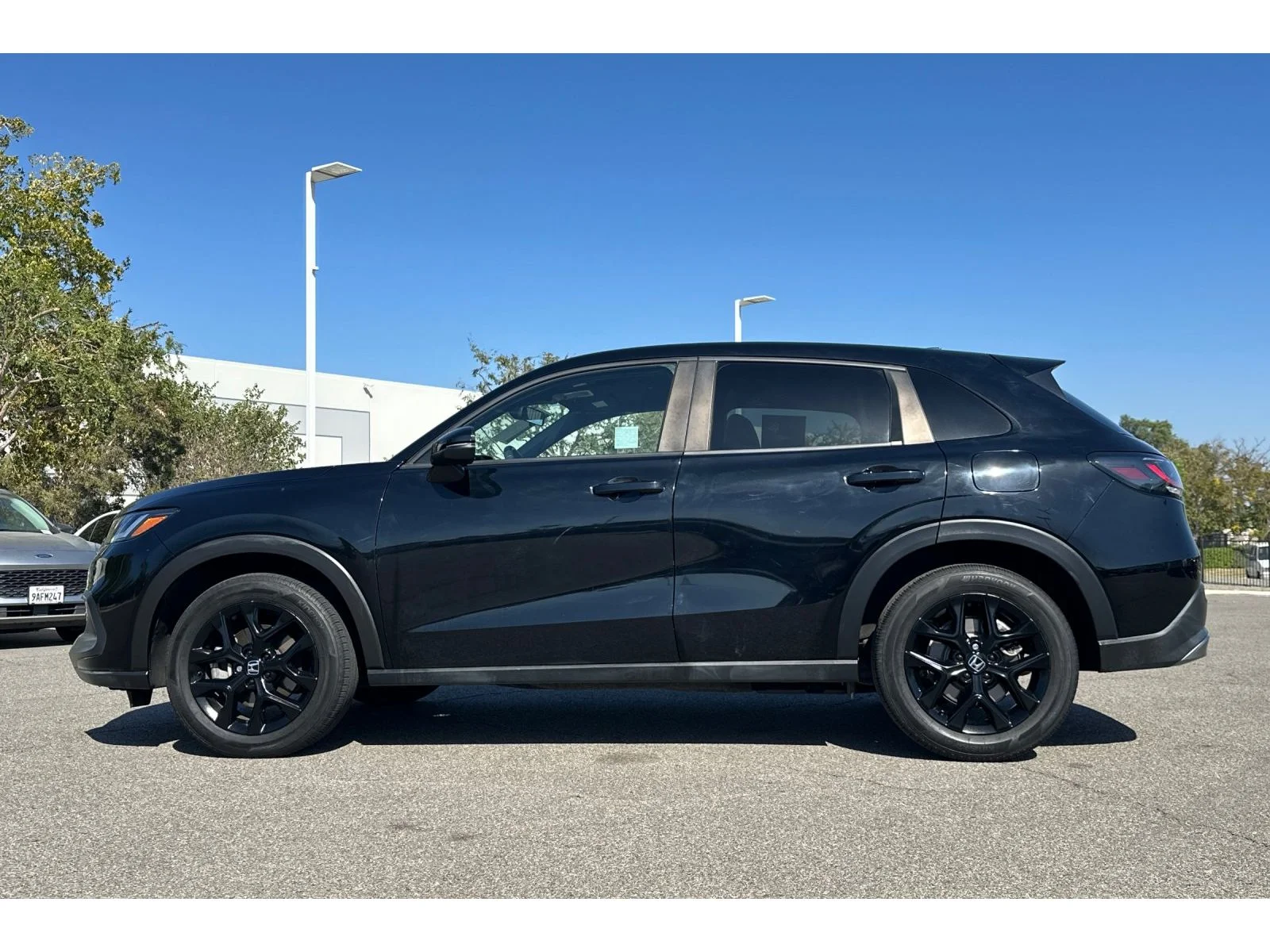 Used 2024 Crystal Black Pearl Honda Sport image 2