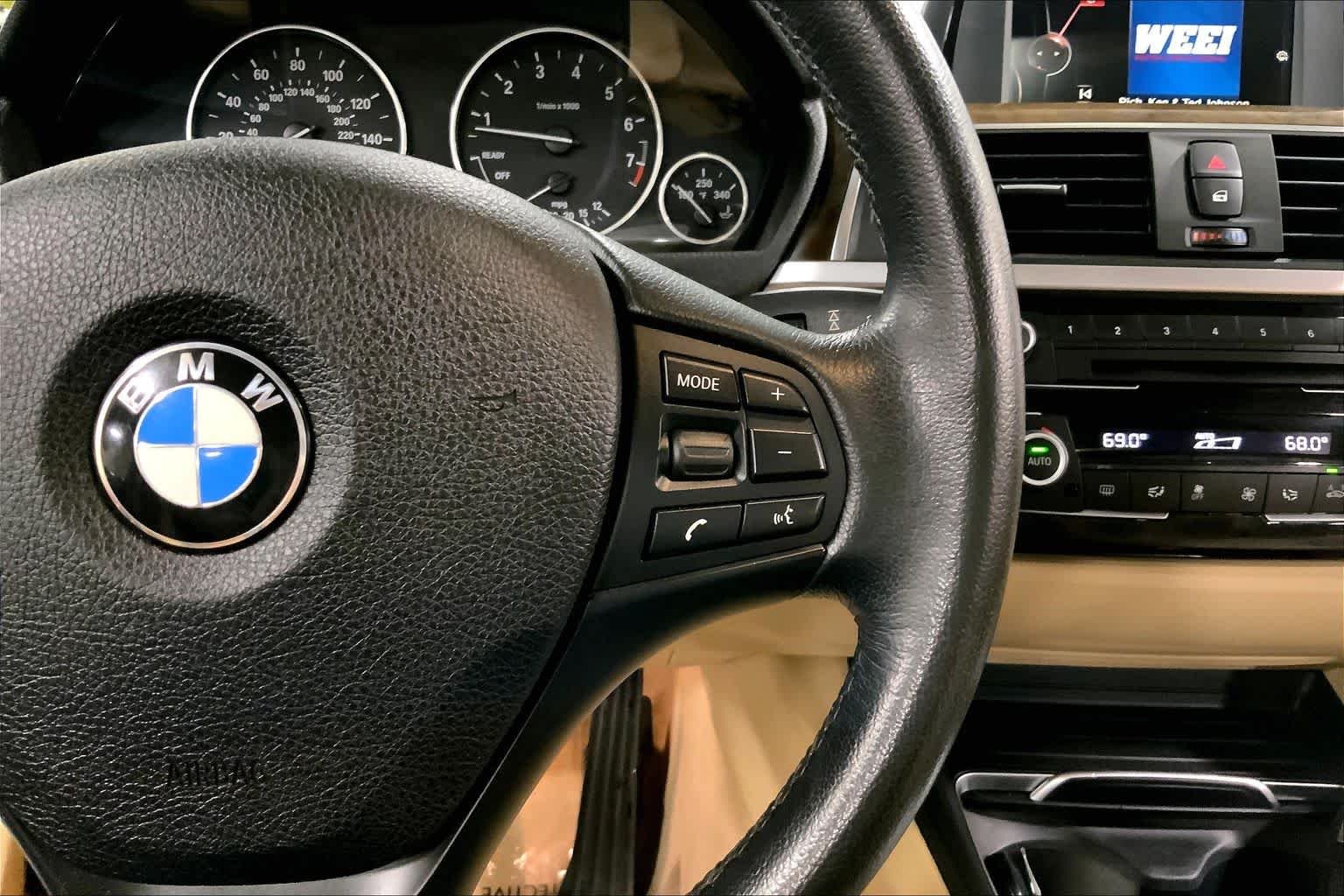 Used 2016 Imperial Blue Metallic BMW 320i xDrive image 25