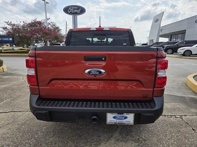 Used 2024 Hot Pepper Red Metallic Tinted Clearcoat FORD LARIAT image 4