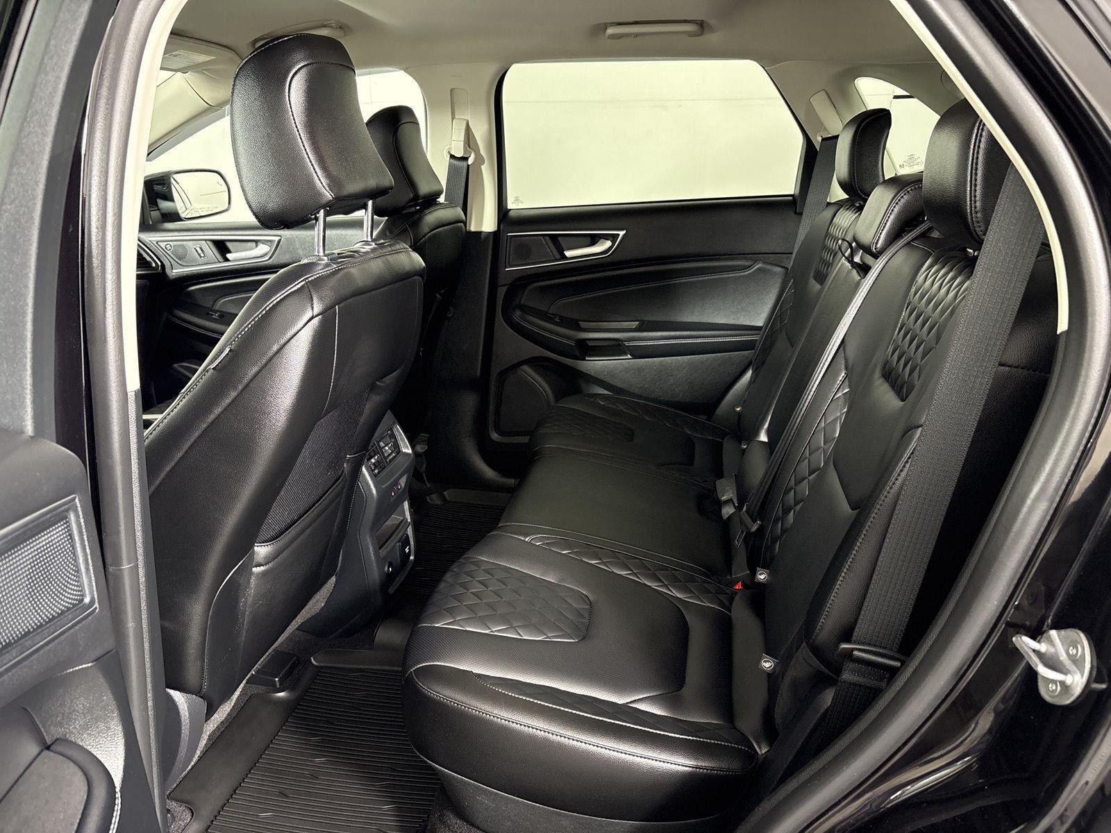 Used 2024 Agate Black Metallic Ford Titanium image 13