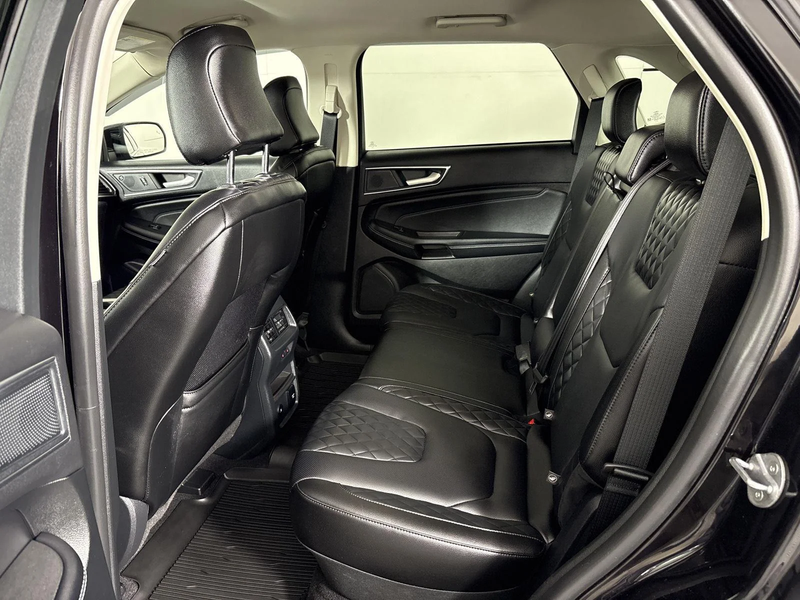 Used 2024 Agate Black Metallic Ford Titanium image 13