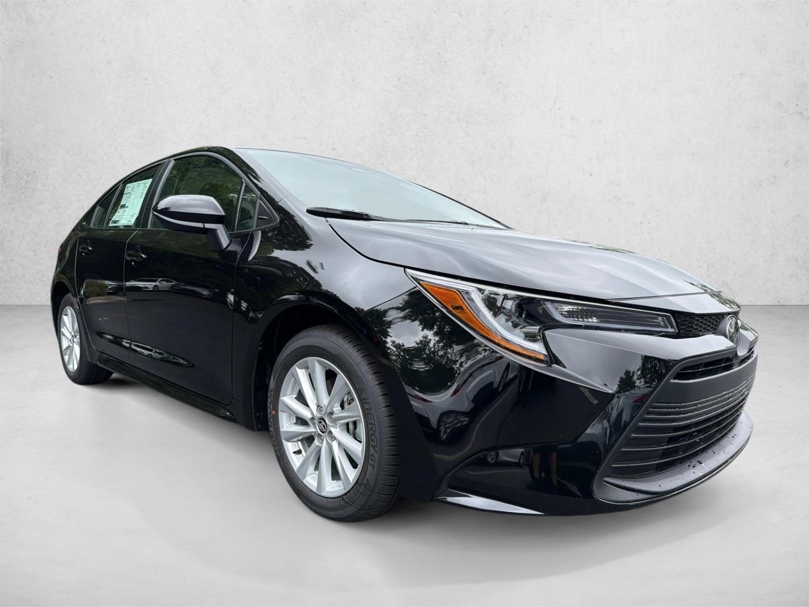 New 2026 Midnight Black Metallic Toyota LE image 1