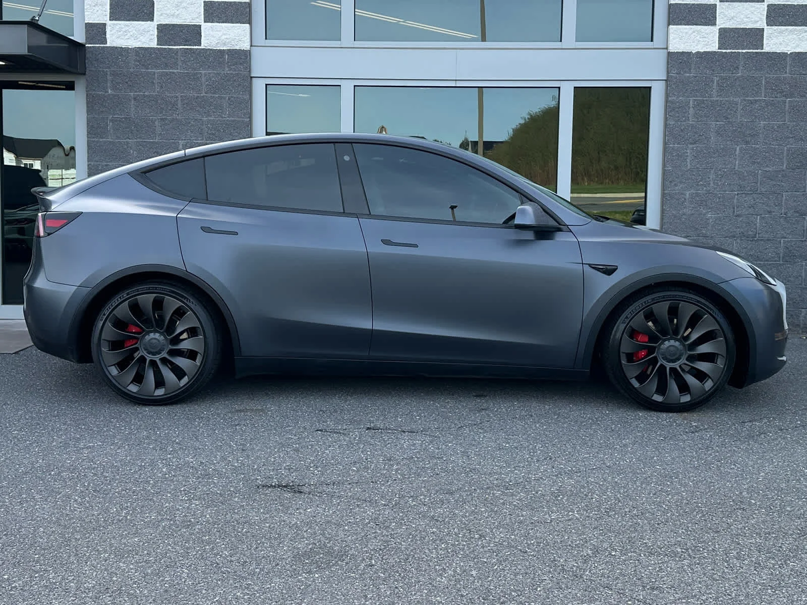 Used 2022 Solid Black Tesla Performance image 3