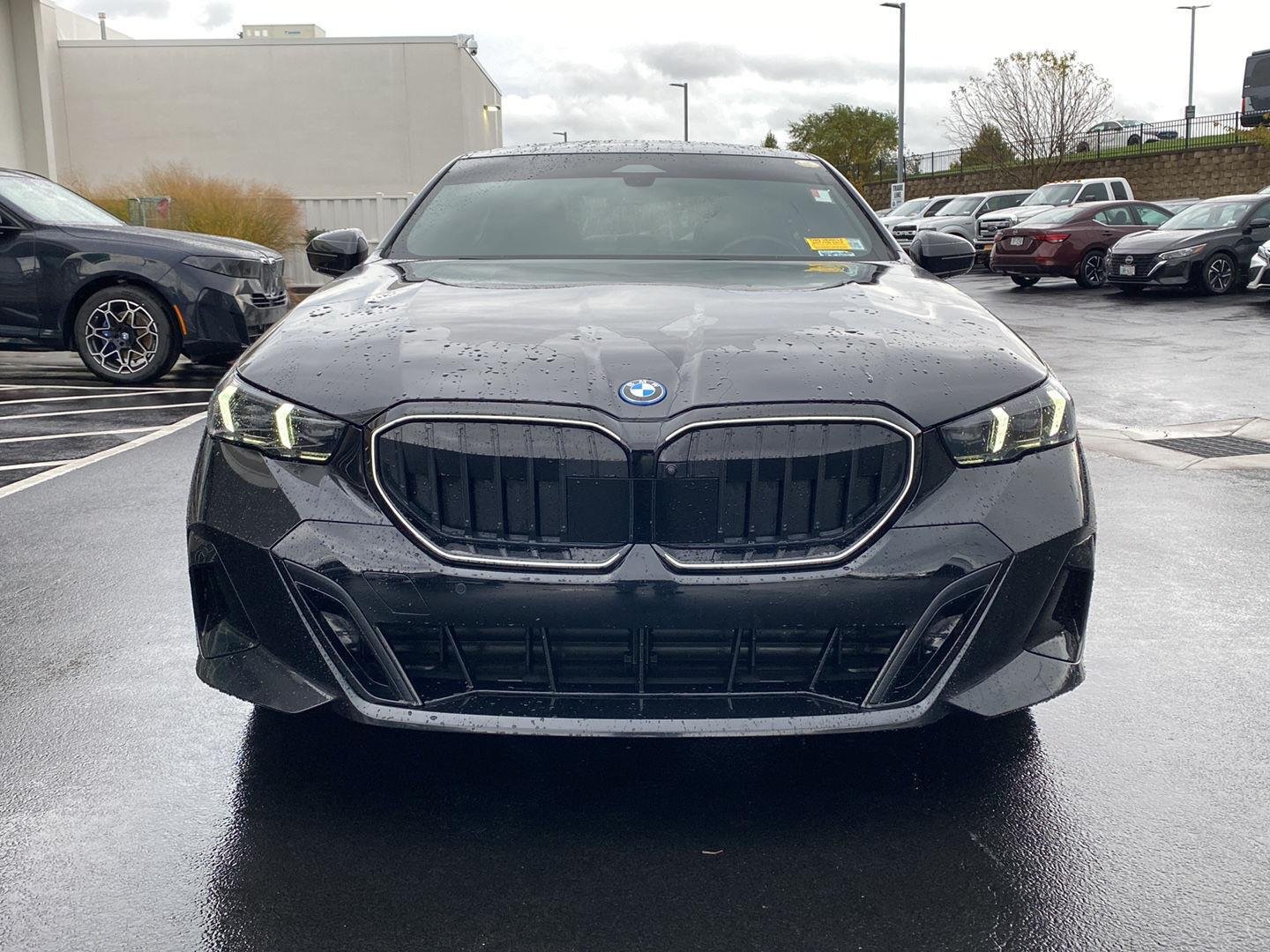 Used 2025 Black Sapphire Metallic BMW 550e xDrive image 8