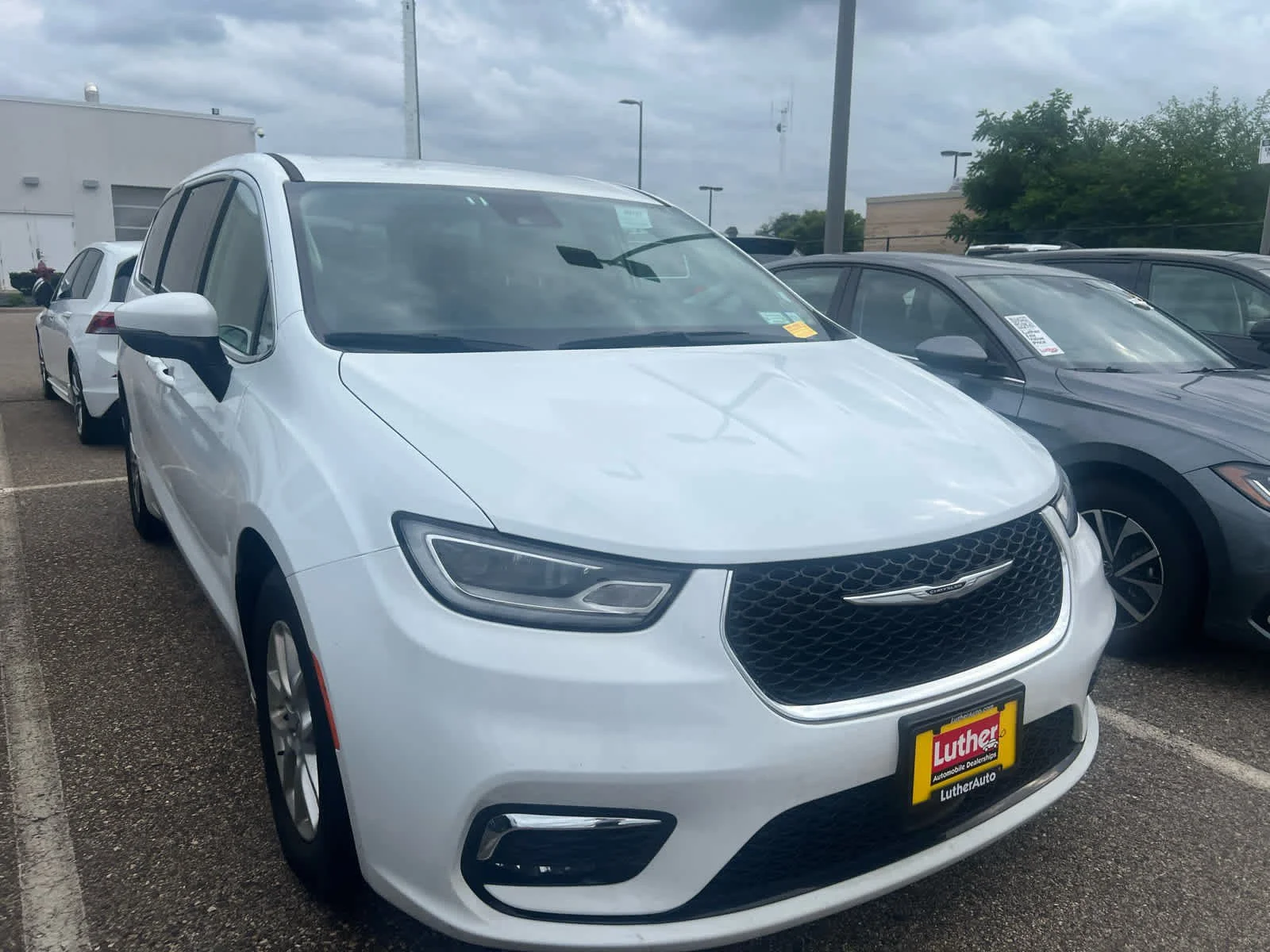Used 2023 Chrysler Pacifica Touring L with VIN 2C4RC1BG1PR574458 for sale in Brooklyn Center, Minnesota