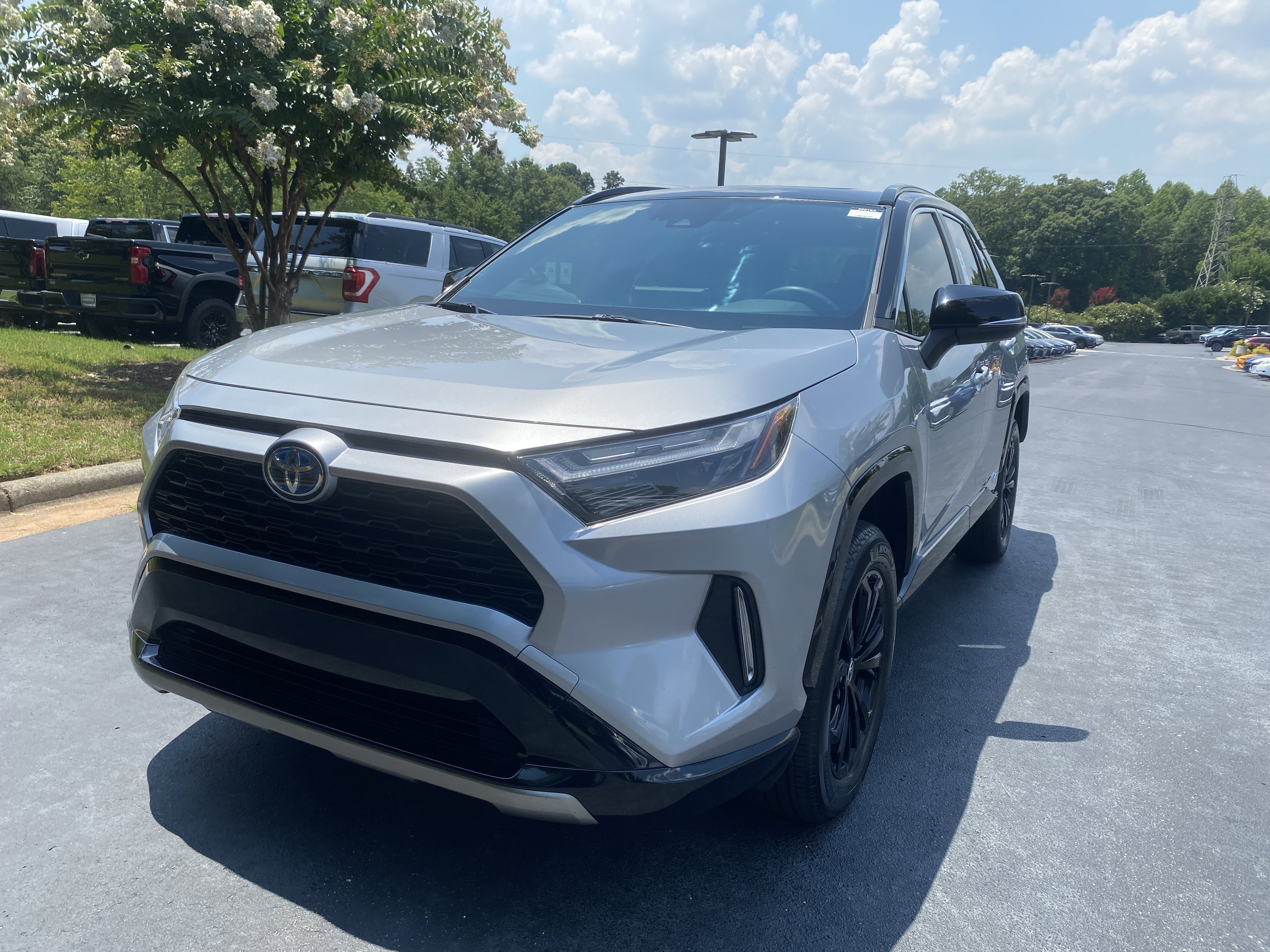 Used 2022 Silver Sky Metallic Toyota Hybrid XSE image 1