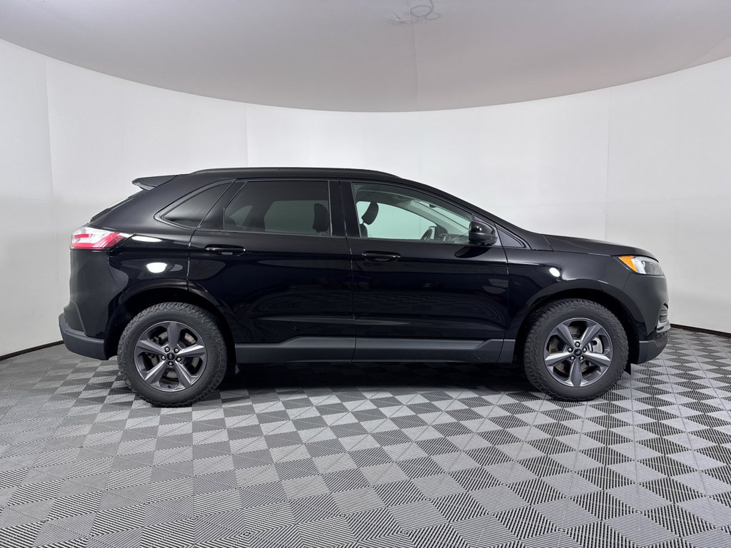 Used 2024 Agate Black Metallic Ford SEL image 13