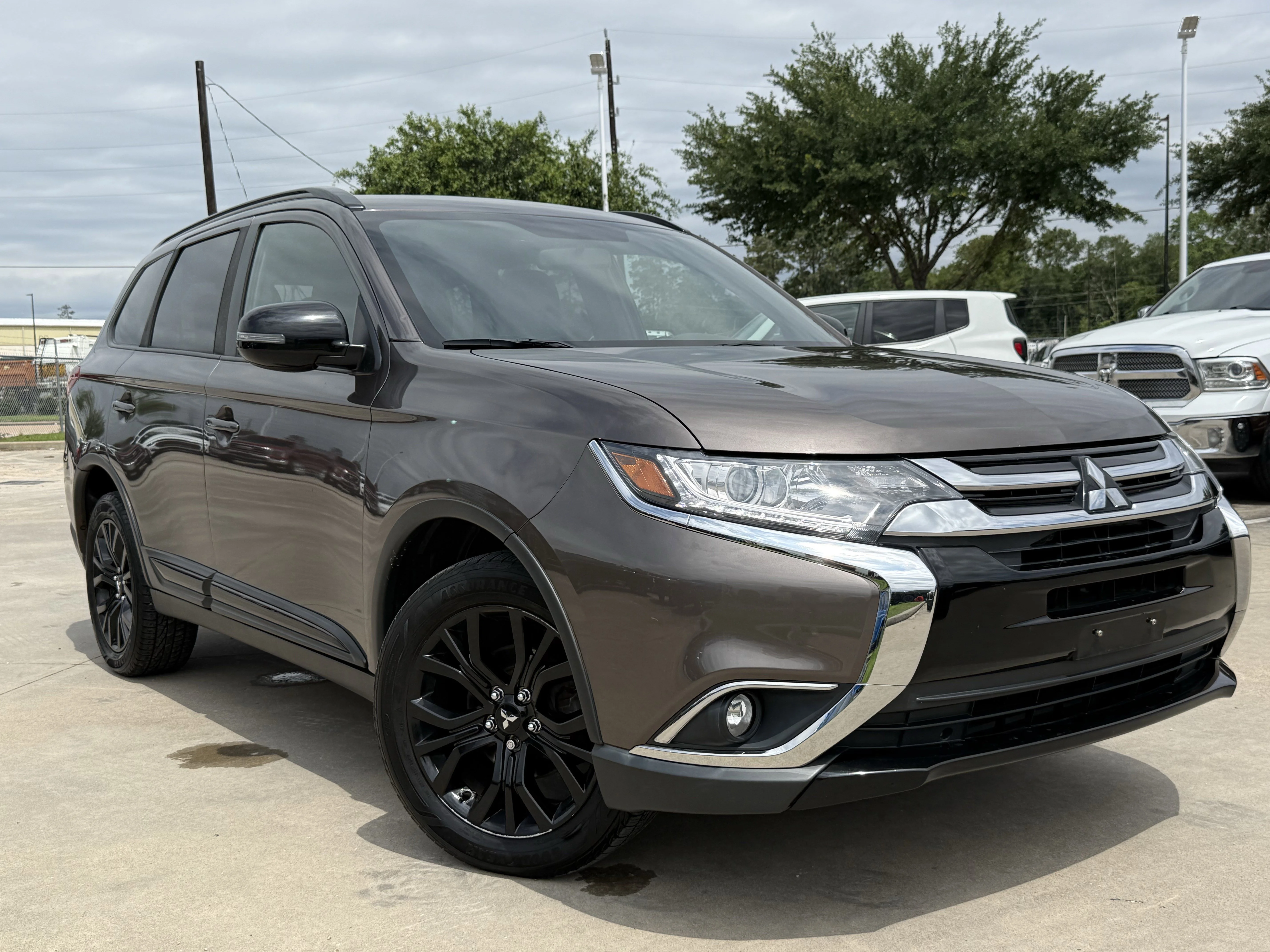 Used 2018 Mitsubishi Outlander LE with VIN JA4AZ3A31JZ052006 for sale in Humble, TX