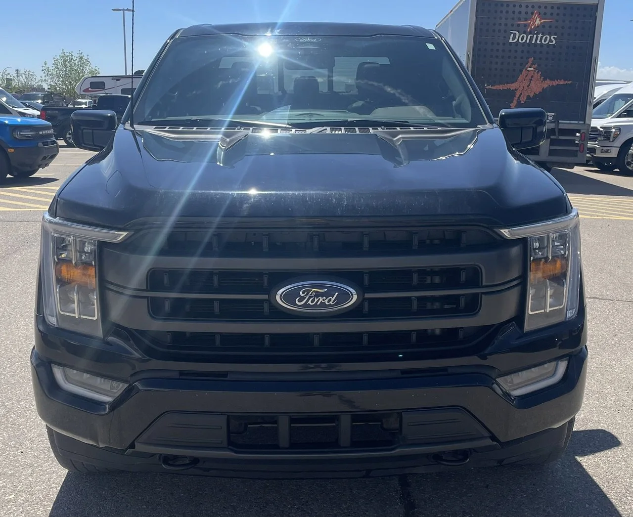 Used 2022 Black Ford LARIAT SuperCrew image 8