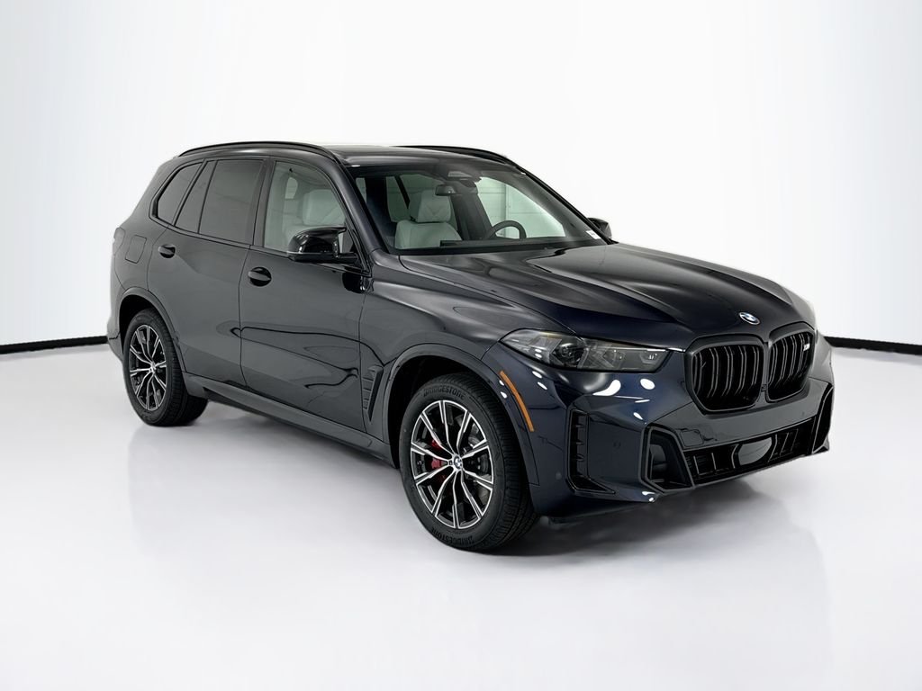 New 2026 Carbon Black Metallic BMW M60i image 3