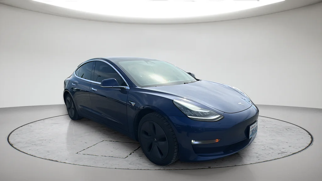 Used 2019 Blue Tesla Standard Range Plus image 1