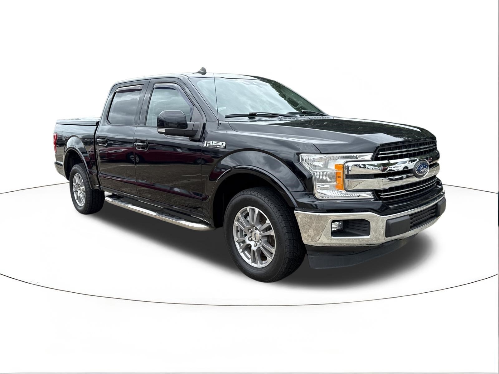 Used 2019 Agate Black Metallic Ford LARIAT image 1