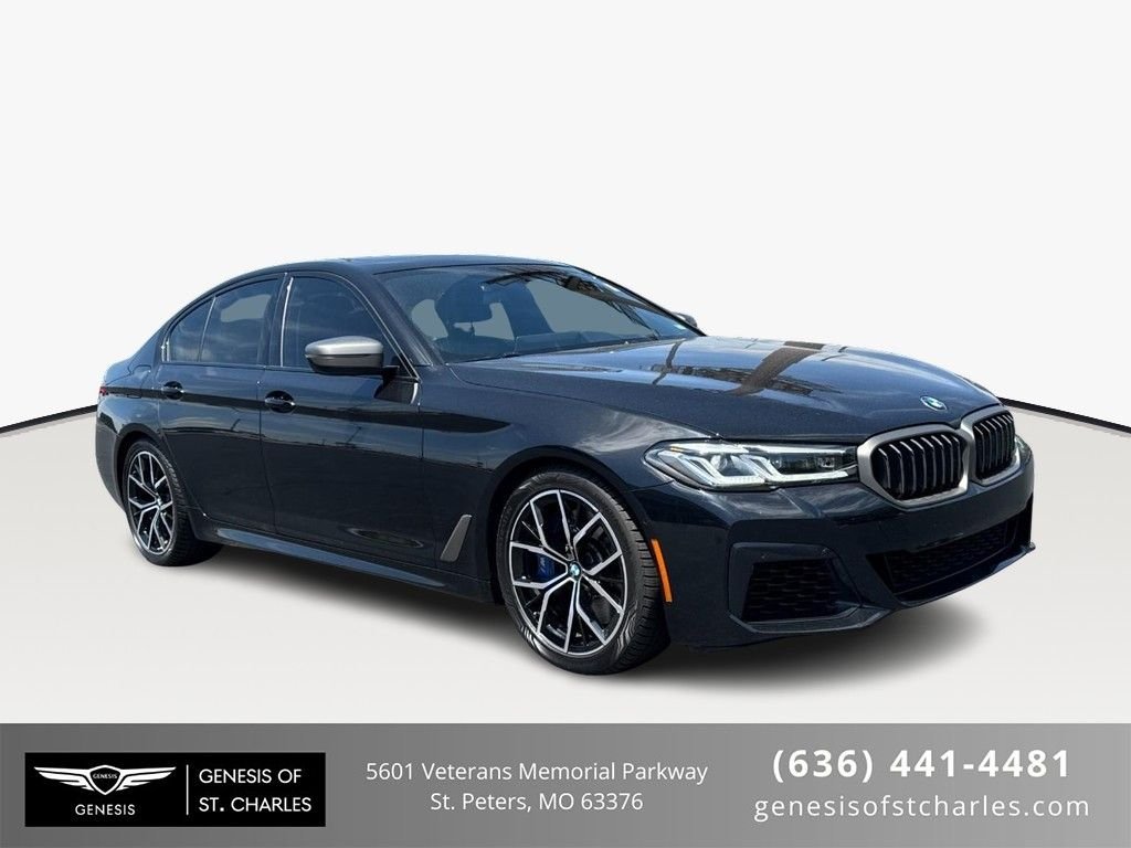 Used 2023 Black Sapphire Metallic BMW M550i xDrive image 1