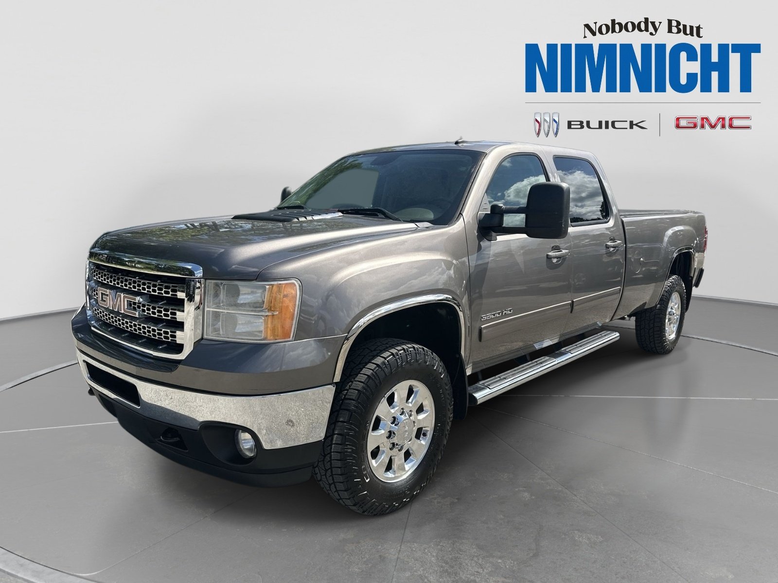 Used 2013 MOCHA STEEL METALLIC GMC SLT image 1