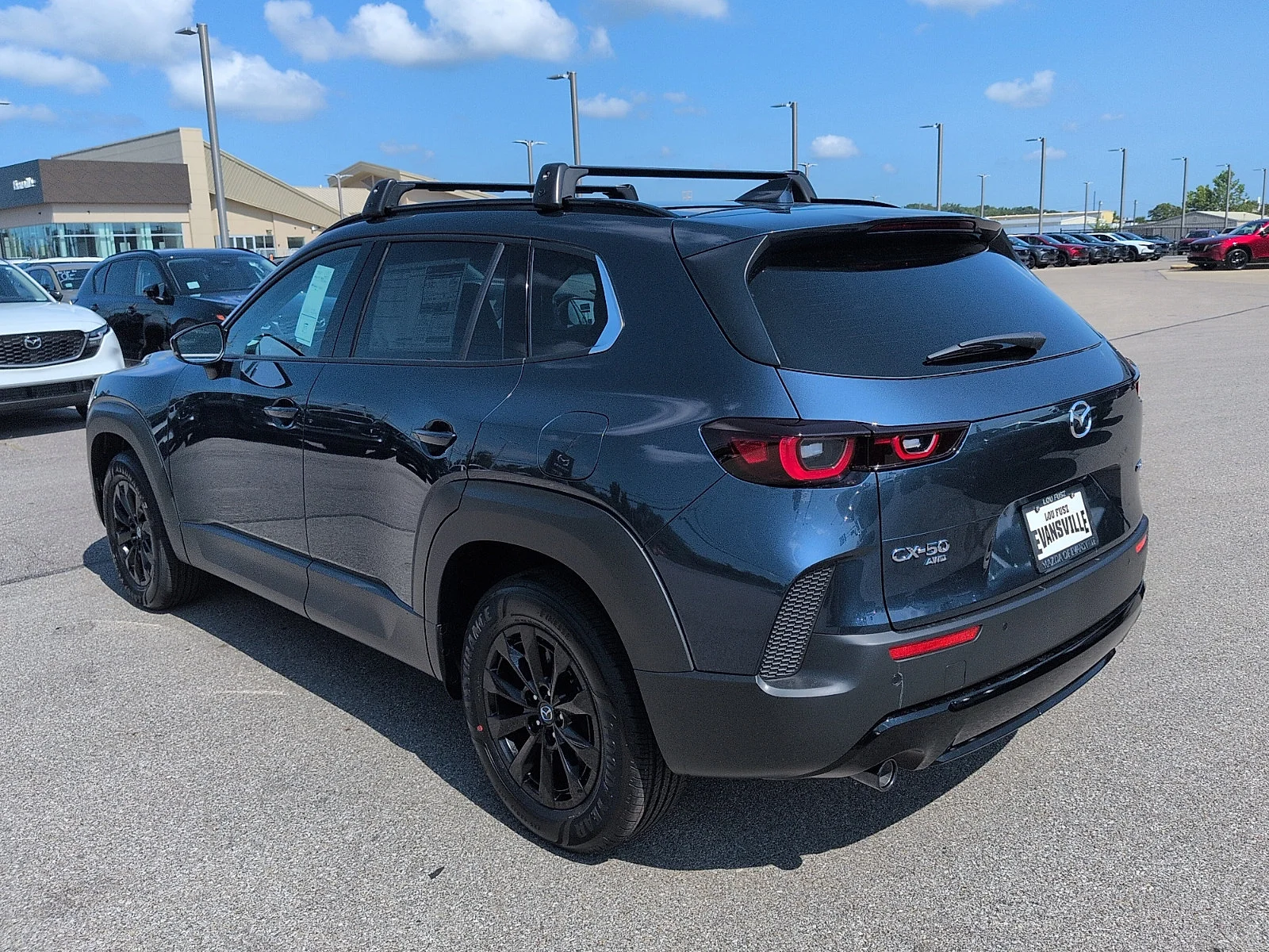 New 2026 Ingot Blue Metallic Mazda Premium image 5
