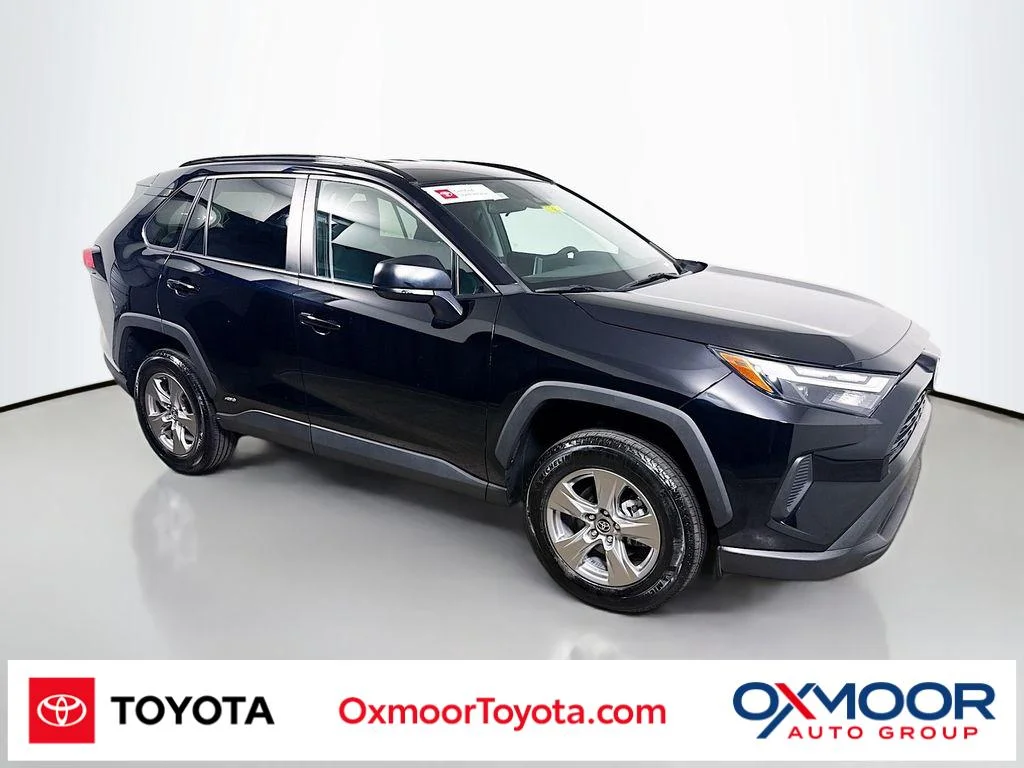 Used 2024 Midnight Black Metallic Toyota Hybrid LE image 1