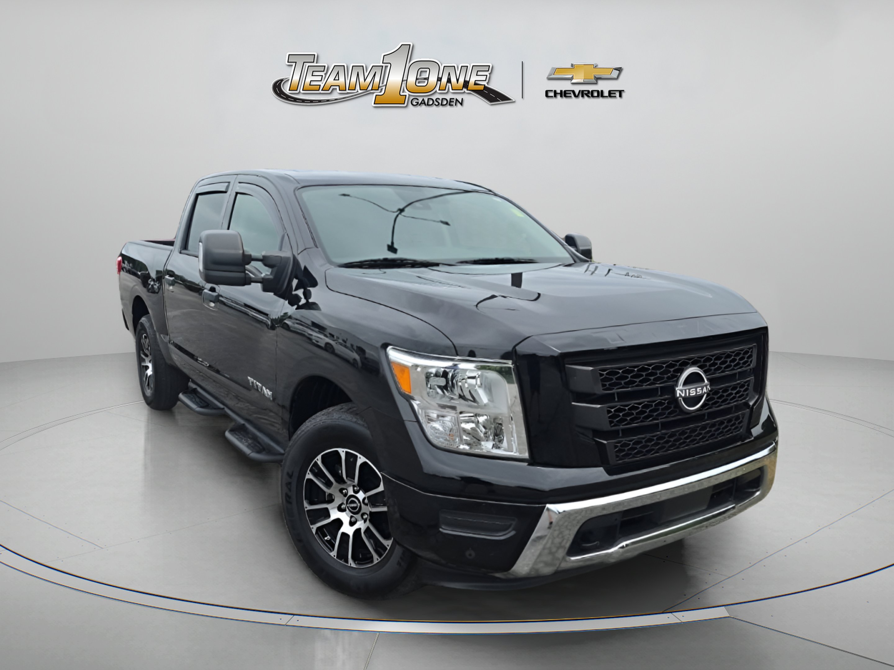 Used 2024 Black Nissan Crew Cab SV 4x4 image 1