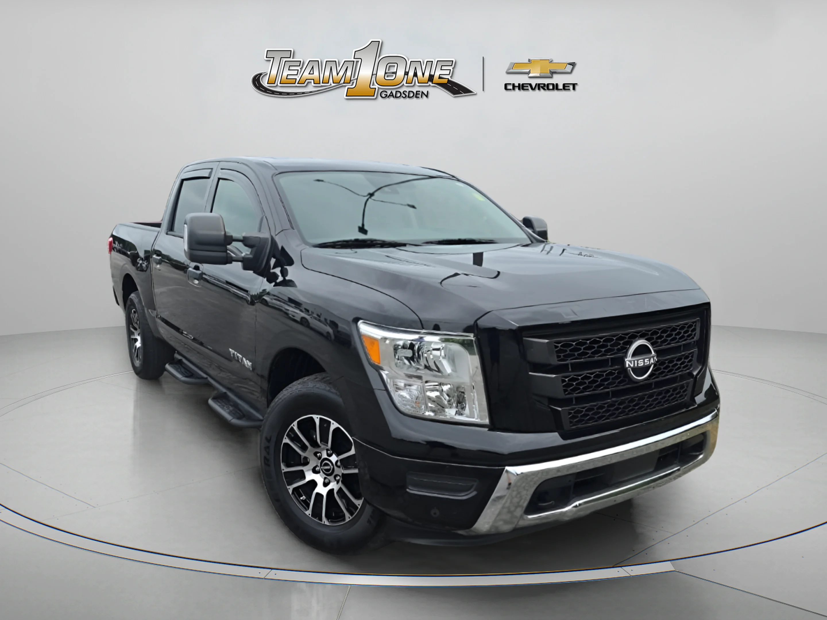 Used 2024 Black Nissan Crew Cab SV 4x4 image 1