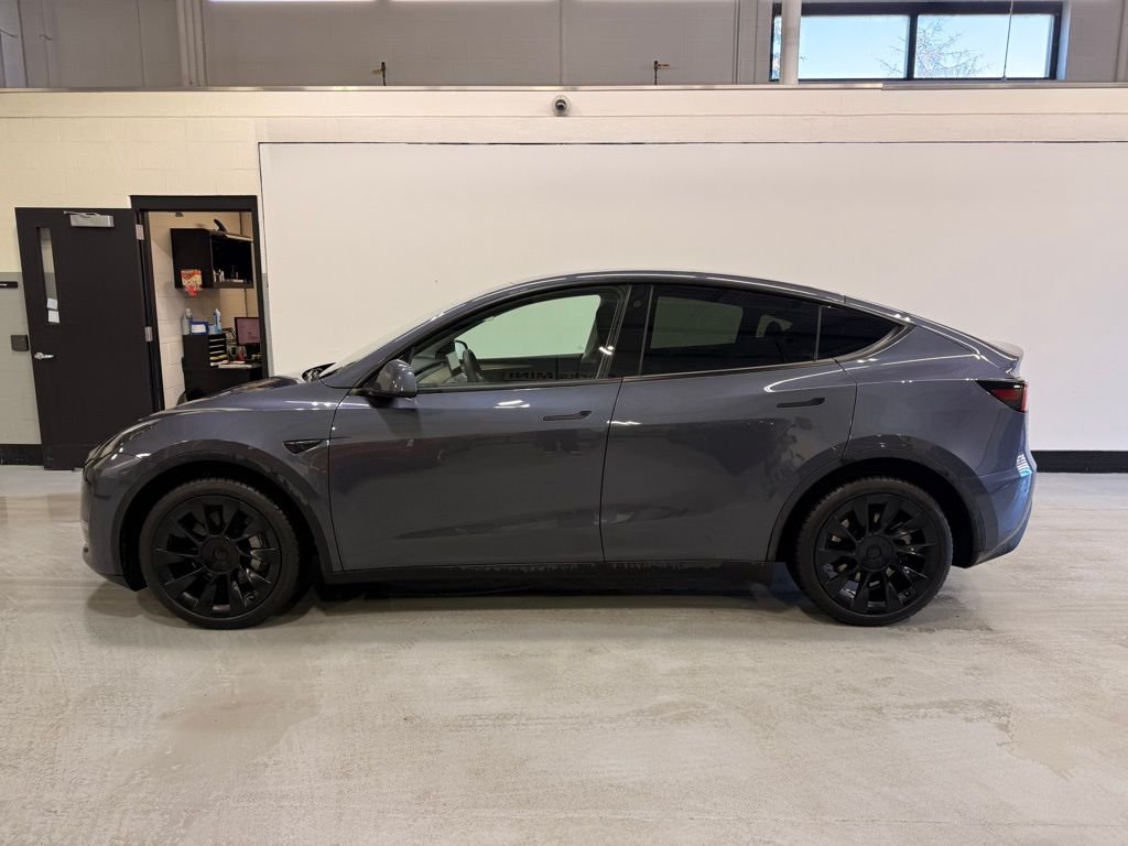 Used 2023 Tesla Model Y Long Range with VIN 7SAYGDEE4PF648837 for sale in Golden Valley, Minnesota