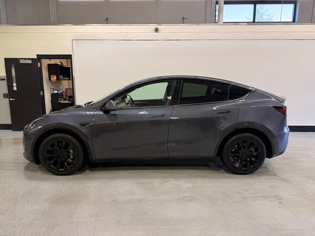 Used 2023 Tesla Model Y Long Range with VIN 7SAYGDEE4PF648837 for sale in Golden Valley, MN