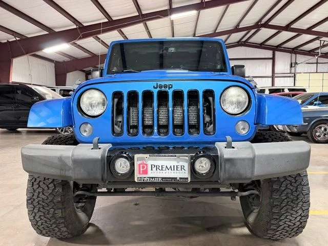 Used 2014 Blue Jeep Unlimited Sahara image 9