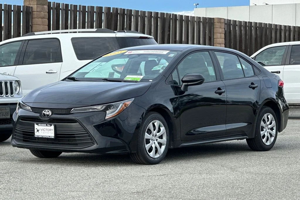 Used 2025 Midnight Black Metallic Toyota LE image 8