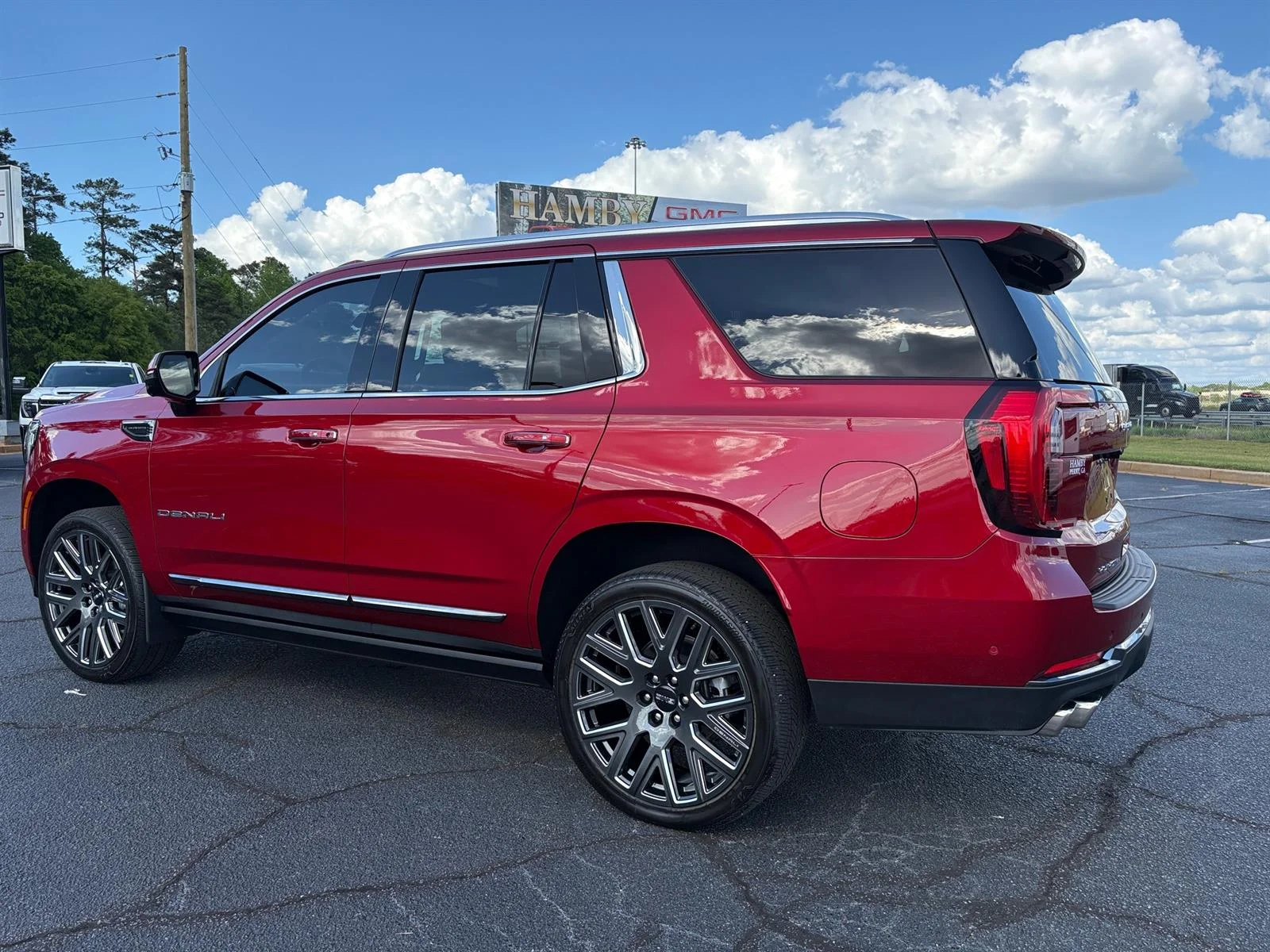 Used 2026 Volcanic Red Tintcoat GMC Denali Ultimate image 6